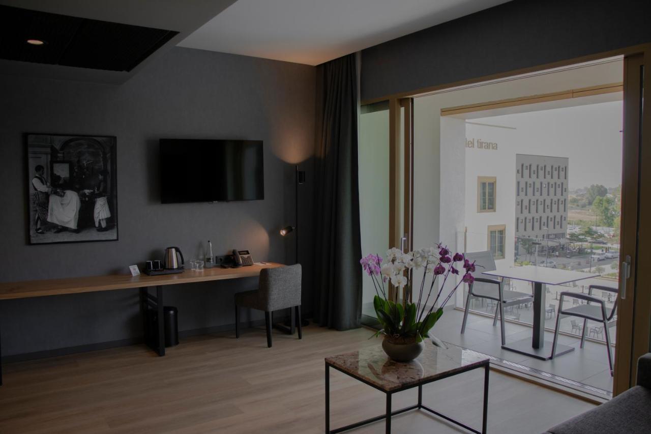 Mk Hotel Tirana Rinas Ngoại thất bức ảnh A room at the hotel