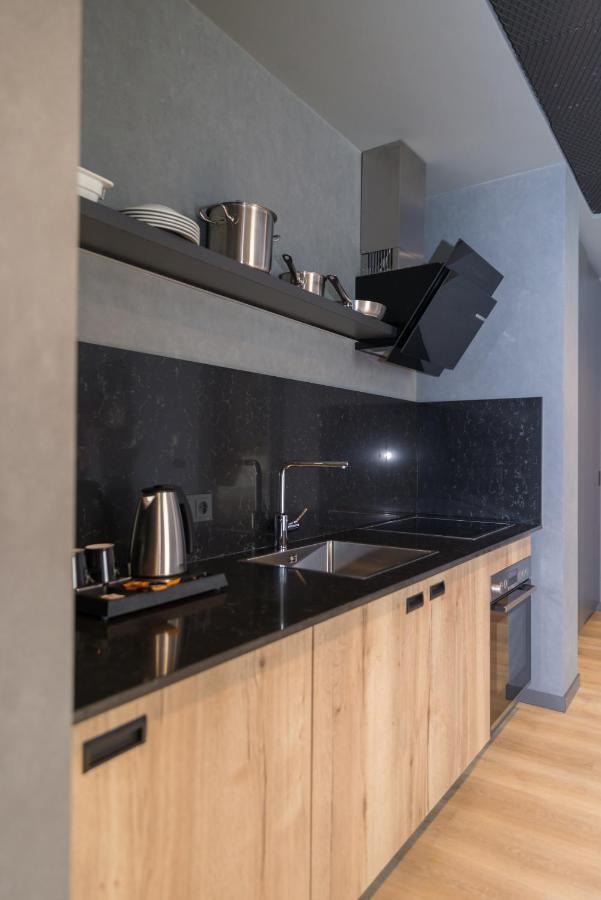 Mk Hotel Tirana Rinas Ngoại thất bức ảnh A kitchen in a serviced apartment in Paris